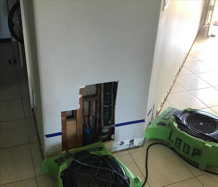 Drying equipment dries a hole in wall.