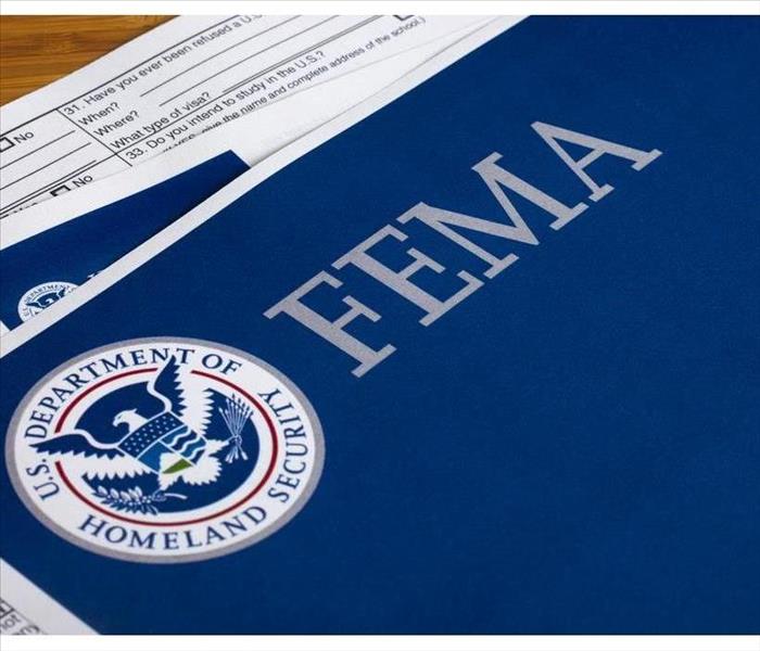 Blue paper with FEMA title and U.S Department of Homeland Security Logo