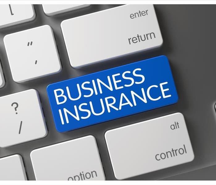 Business Insurance. Keyboard of a computer with the word Business Insurance
